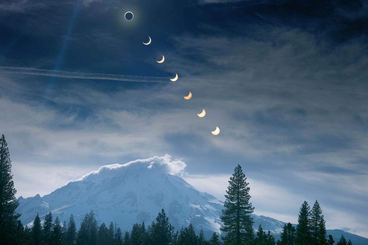 A multiple exposure image of an annular solar eclipse over Mount Shasta near McCloud on May 20, 2012.