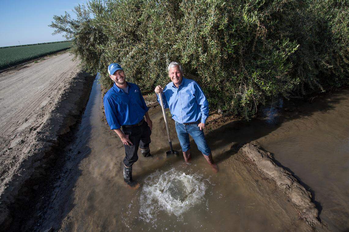 On-farm recharge on Terranova Ranch in Fresno County, 2017. Sustainable Conservation Project Director of Water Resources Joe Choperena (left) and Fresno County farmer Don Cameron (right).