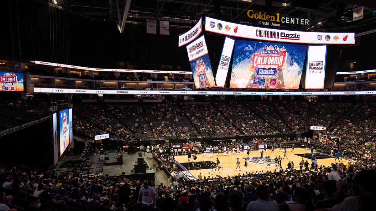 The Sacramento Kings and Golden State Warriors warm up before their NBA California Classic game Tuesday at Golden 1 Center in Sacramento. The Kings have directed employees to get COVID-19 vaccines by Nov. 1.