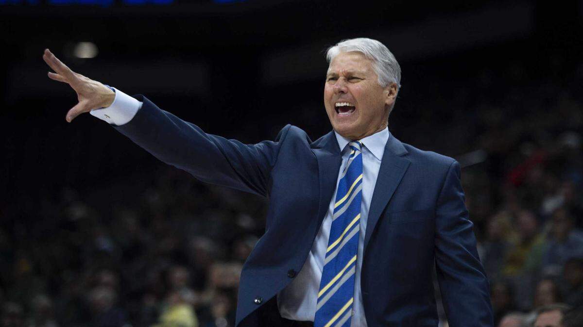 UC Davis basketball coach Jim Les gestures to his team during a game between Sacramento State and UC Davis in 2019. Les and his team experienced a bird strike on their flight to Burbank on Tuesday, Jan. 10, 2023. The plane returned to Sacramento International Airport without incident.