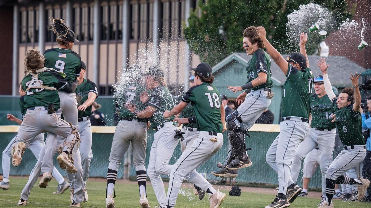 The Granite Bay Grizzlies rush the field after their win against the Rio Americano Raiders for the CIF Sac-Joaquin Section Division II high school baseball championship title Thursday, May 25, 2023, at Sacramento City College.