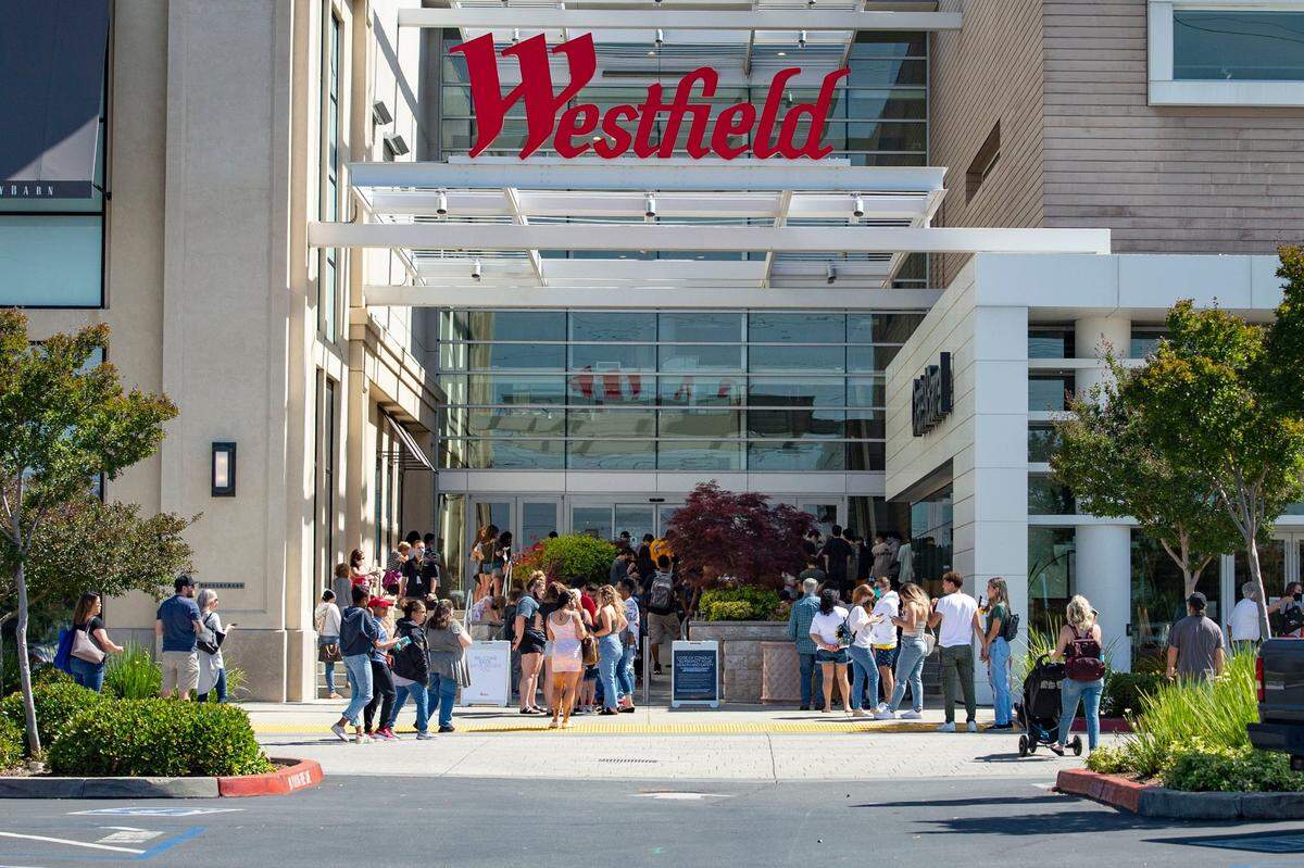 Shoppers line up outside of the Westfield Galleria at Roseville mall on Friday, May 22, 2020. Banana Republic and Forever 21 closed locations in the shopping center.