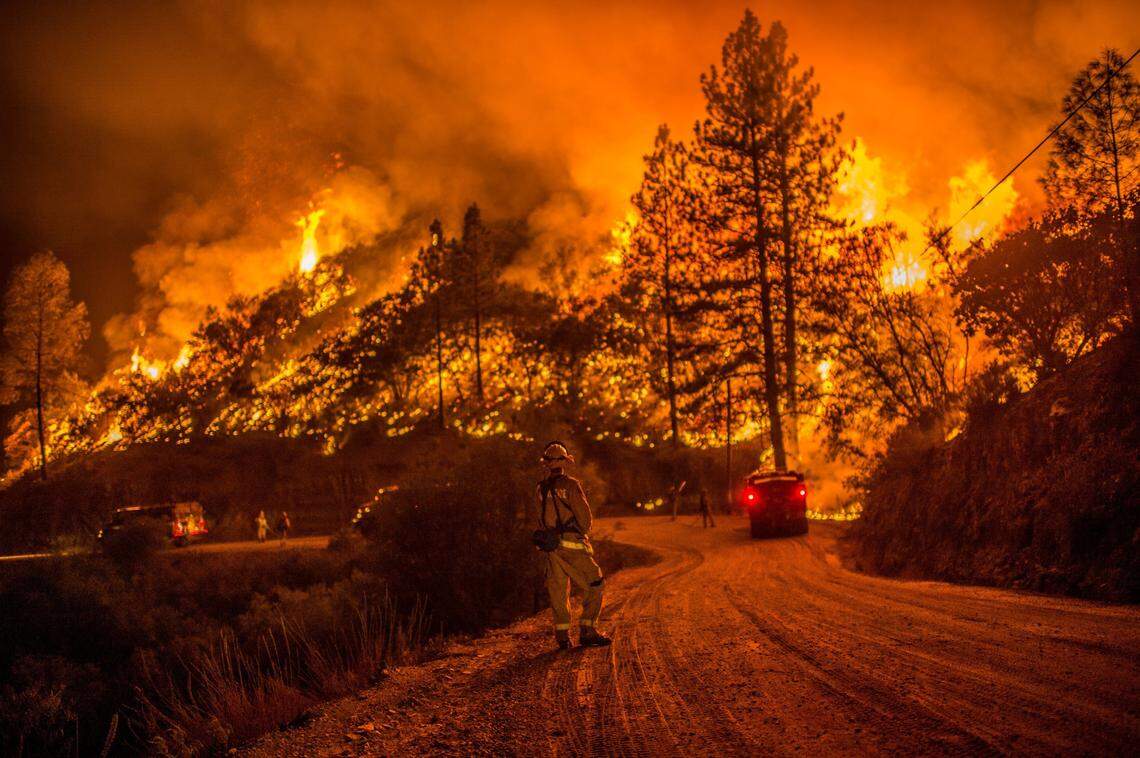 Fire crews run controlled burns at night to contain the Butte Fire near Arnold in 2015.