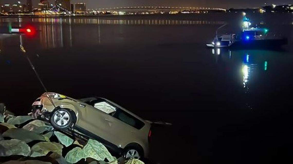 An accused drunk driver and his passenger escaped a Kia Soul through a window after it plunged into San Diego Bay, California police say.