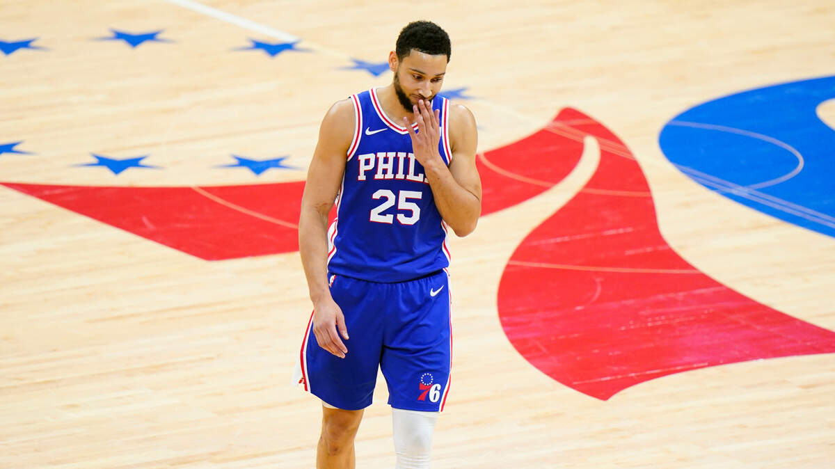 FILE - In this June 16, 2021 file photo, Philadelphia 76ers’ Ben Simmons wipes his face during the second half of Game 5 in a second-round NBA basketball playoff series against the Atlanta Hawks in Philadelphia. Simmons will not report to the 76ers when they open training camp on Tuesday, Sept. 28, 2021. Team President Daryl Morey said there’s still hope Simmons will return at some point. (AP Photo/Matt Slocum)