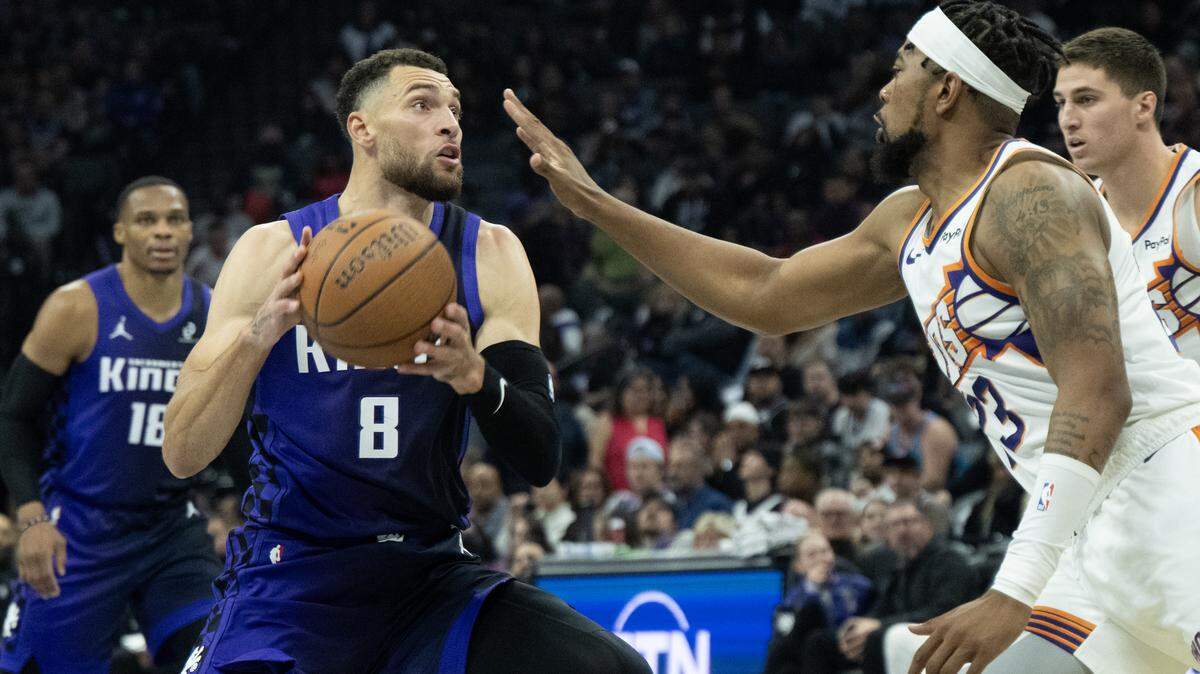 Sacramento Kings guard Zach LaVine drives against Phoenix Suns guard Jordan Goodwin during a game at Golden 1 Center on Wednesday in Sacramento.