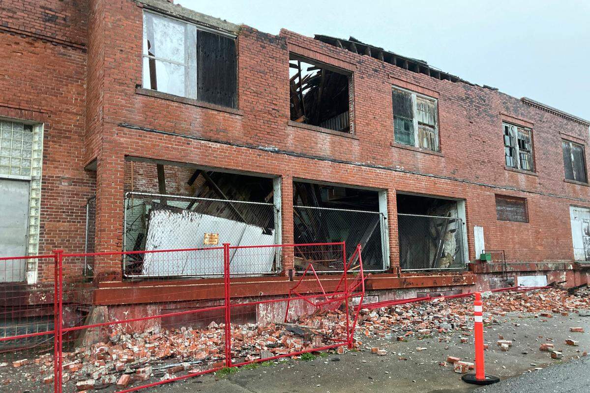 Earthquake damage is seen at the Humboldt Creamery building in Loleta, Calif., Tuesday, Dec. 20, 2022. A strong earthquake shook a rural stretch of Northern California early Tuesday, jolting residents awake, cutting off power to 70,000 people, and damaging some buildings and a roadway, officials said. Two injuries were reported. (Ruth Schneider/The Times-Standard via AP)
