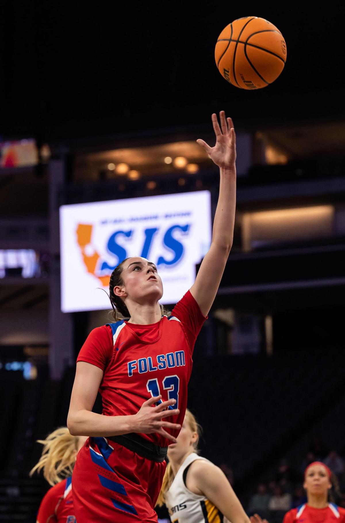 Folsom Bulldogs’ Ava Rawlins (13) goes up for a shot during the second period against Folsom at the high school girls basketball Sac-Joaquin Section Division I championship game Saturday, Feb. 26, 2022, at Golden 1 Center in Sacramento. Oak Ridge edged past Folsom, 41-40, for the section title.