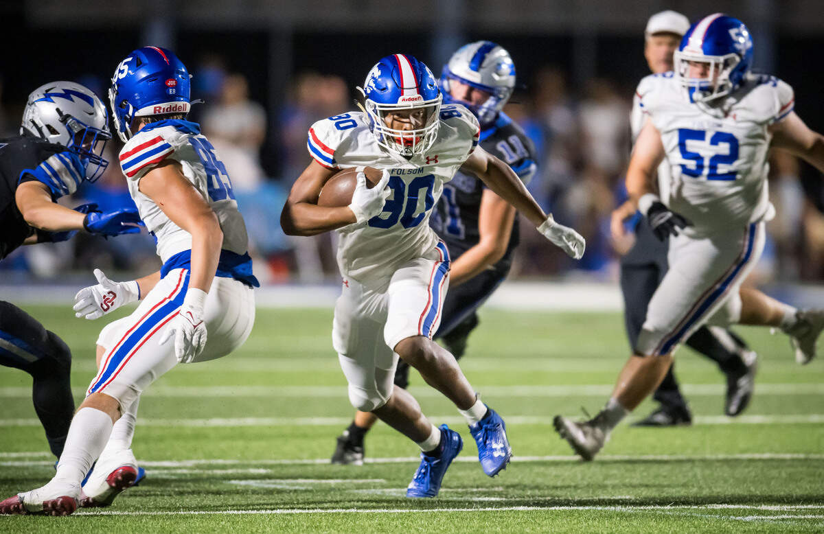 Folsom Bulldogs wide receiver Brian Ray III (80) runs against the Rocklin Thunder defense in October. Ray plans to attend Army.