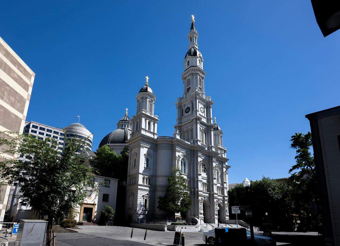 The Cathedral of the Blessed Sacrament stands on 11th Street in downtown Sacramento on Tuesday, Aug. 20, 2024. In the late 1800s, Bishop Manogue convinced the Vatican to allow him to pursue its construction.