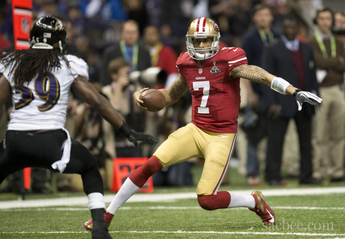 San Francisco 49ers quarterback Colin Kaepernick (7) slides during the NFL Super Bowl XLVII football game, Sunday, Feb. 3, 2013, at the Superdome in New Orleans.