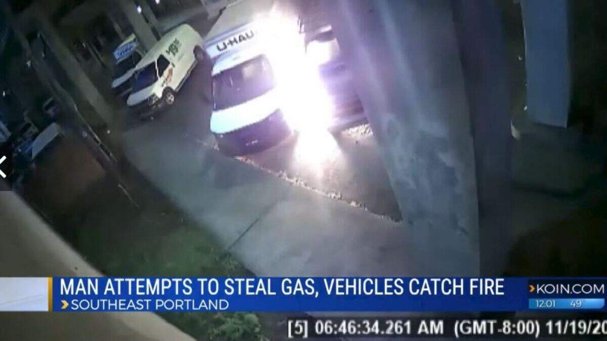 A man caught on security camera trying to siphon gas from a U-Haul truck in Portland, Oregon, caught on fire and fled in flames after something went wrong, police say. They are still seeking the man.