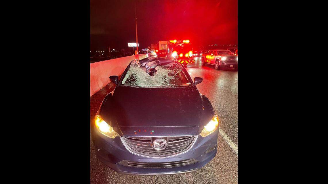 A tire flew into another car’s windshield on Interstate 15 in Bountiful, Utah, officials said on Jan. 18, 2023. The driver had a cut on her head from the incident.