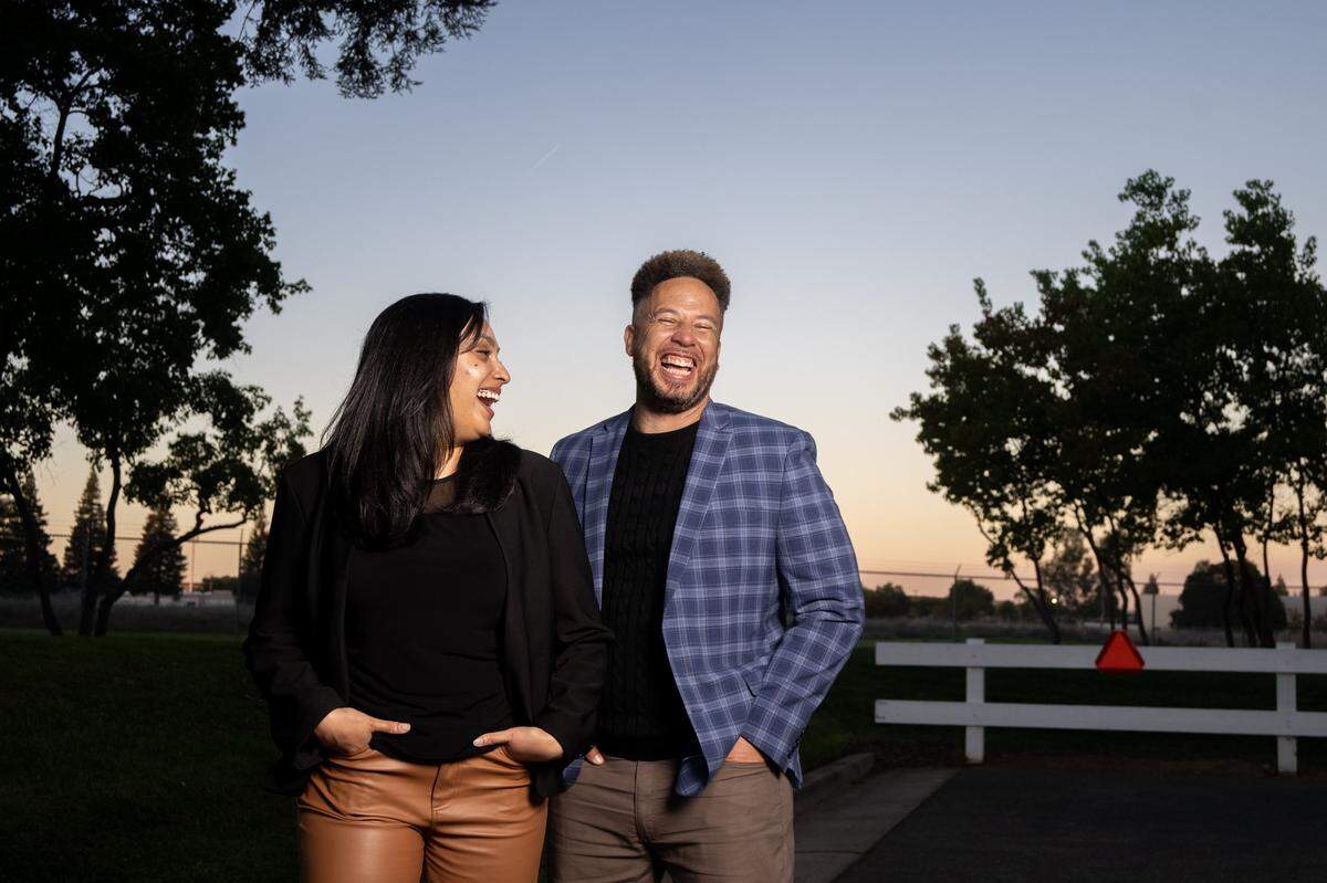 Developers Joshua Wood and Charanjeet Kaur Tiwana-Purewal pose for a portrait at the location of the proposed indoor soccer arena near the intersection of Kilgore Road and Trade Center Drive in Rancho Cordova on Wednesday.