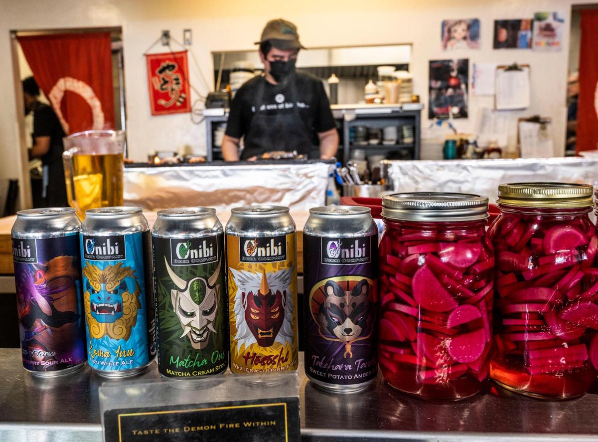 Onibi beers are on display at Binchoyaki on Thursday, including Takehara Tanuki, named after Binchoyaki’s chef Craig Takehara. The beer was born from the growing demand for Japanese beer and the inability to get it to the region from Japan during COVID.
