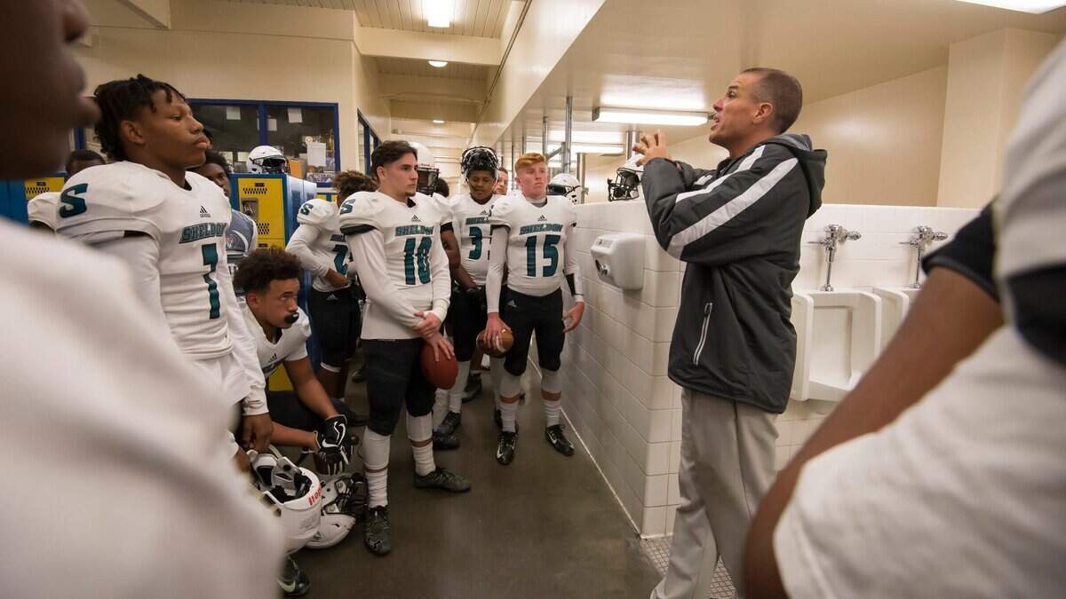 Football coach Joe Cattolico, speaking with his team before a game last season, has led Sheldon High School to a 10-1 record this season which includes opening the Sac-Joaquin Section Division I playoffs Friday with a 27-14 victory over Modesto.