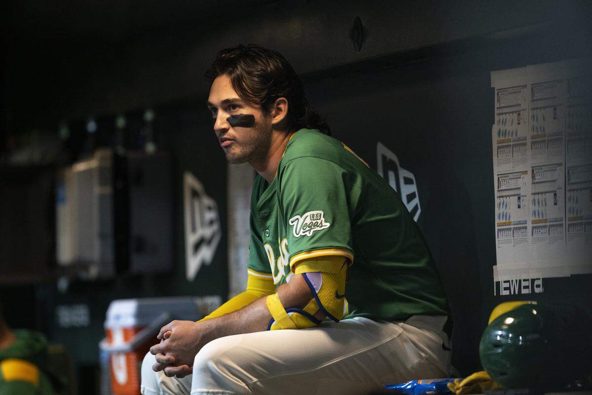 Athletics shortstop Jacob Wilson (5) sits in the dugout during a game between the Athletics and the Red Sox at Sutter Health Park in West Sacramento on Monday, Sept. 8, 2025.