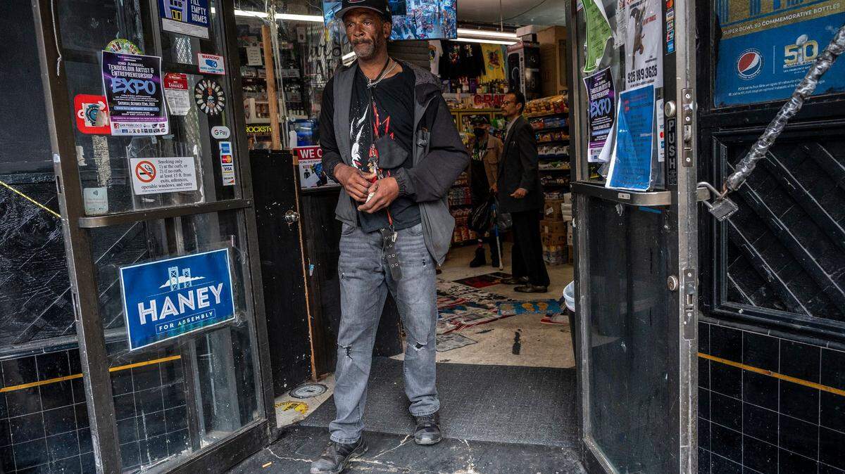 Derrick Tilley, 55, cashed his Community Payee Partnership check on the corner of Ellis and Jones street in San Francisco on Wednesday, Oct. 12, 2022. He said he left his SRO unit a couple of weeks ago and was living on the streets. Community Payee Partnership is a nonprofit that helps severely mentally ill people, people addicted to drugs and homeless people manage their disability benefits.