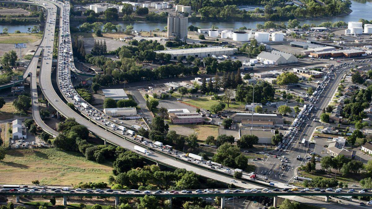 Construction work on the W-X freeway causes a huge backup along the eastbound Highway 50 corridor  on Tuesday, April 22, 2014 in West Sacramento. California spends gas taxes widening highways like 50 rather than maintaining local roads. 