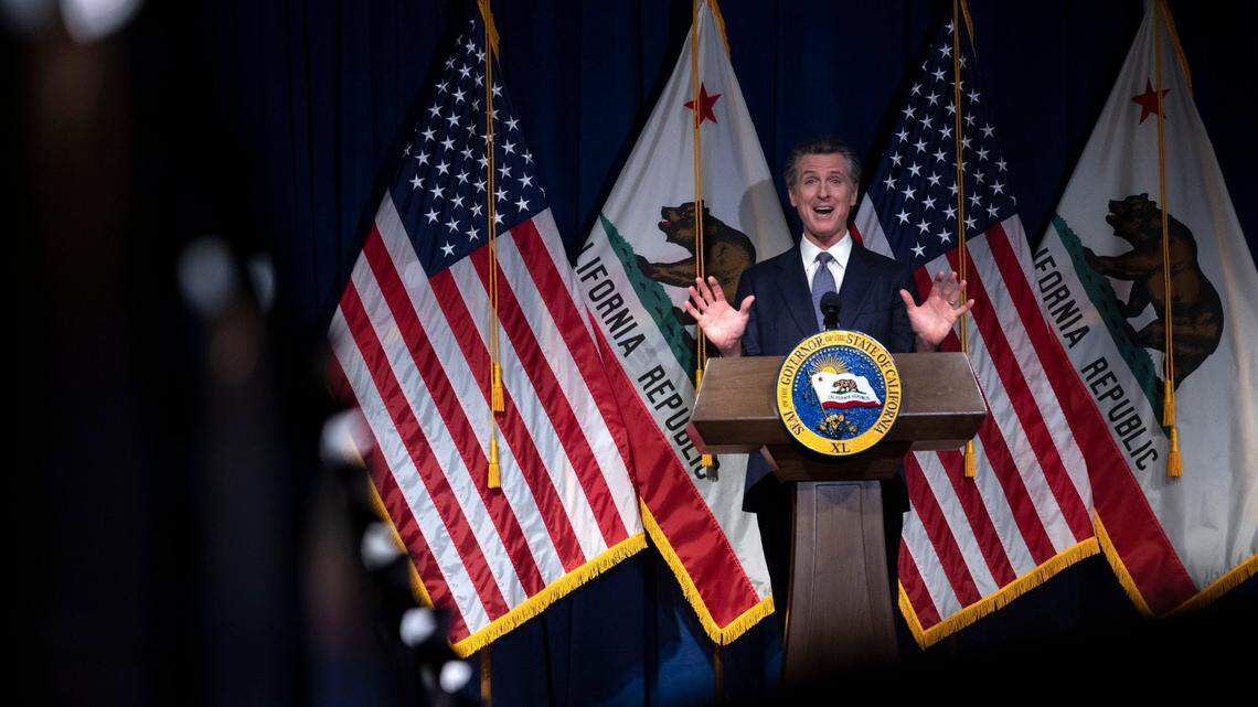California Gov. Gavin Newsom presents his proposed state budget on Monday, Jan. 10, 2022, in the auditorium of the new Natural Resources building in Sacramento.