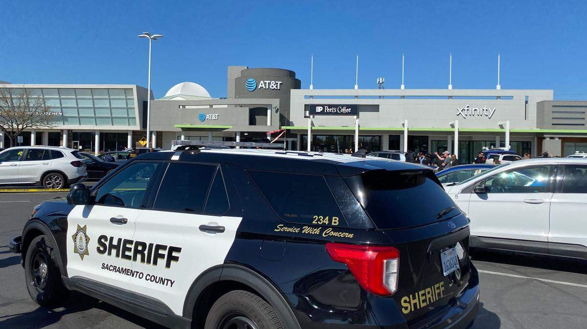 A large law enforcement presence responded to the AT&T store near Arden Fair mall on Thursday, where the suspect in a double homicide Wednesday night in Arden Arcade shot himself before being taken into custody, authorities said.