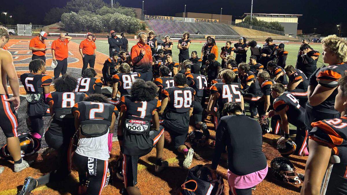 The Roseville Tigers discuss their win over the Del Campo Cougars Friday, Oct. 11, 2024, in Roseville.