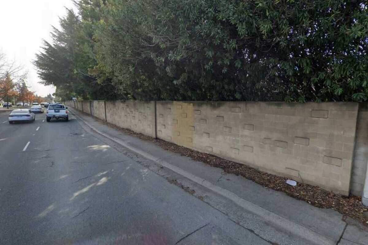 A sound wall is seen along Sunrise Boulevard south of Wildridge Drive in Fair Oaks in February 2025. Sacramento County began demolishing and replacing a 480-foot section of the roughly 40-year-old wall this week after engineers determined it had become a fall risk due to structural displacement linked to nearby trees.