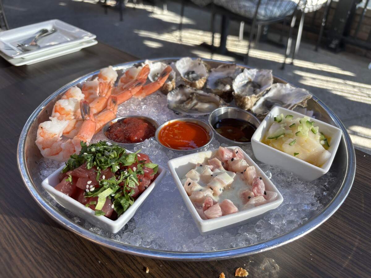 The fresh chilled seafood plateau at Scott’s Seafood Roundhouse in Folsom comes with a sampling of various raw fish and shellfish dishes, including poke and aguachile created by executive chef Nick Blessing.