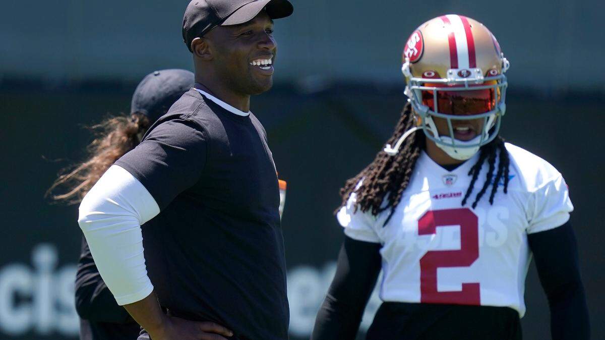 San Francisco 49ers defensive coordinator DeMeco Ryans stands next cornerback Jason Verrett at the team’s training facility in Santa Clara on May 25, 2021. He could be a rising star in the NFL coaching ranks.