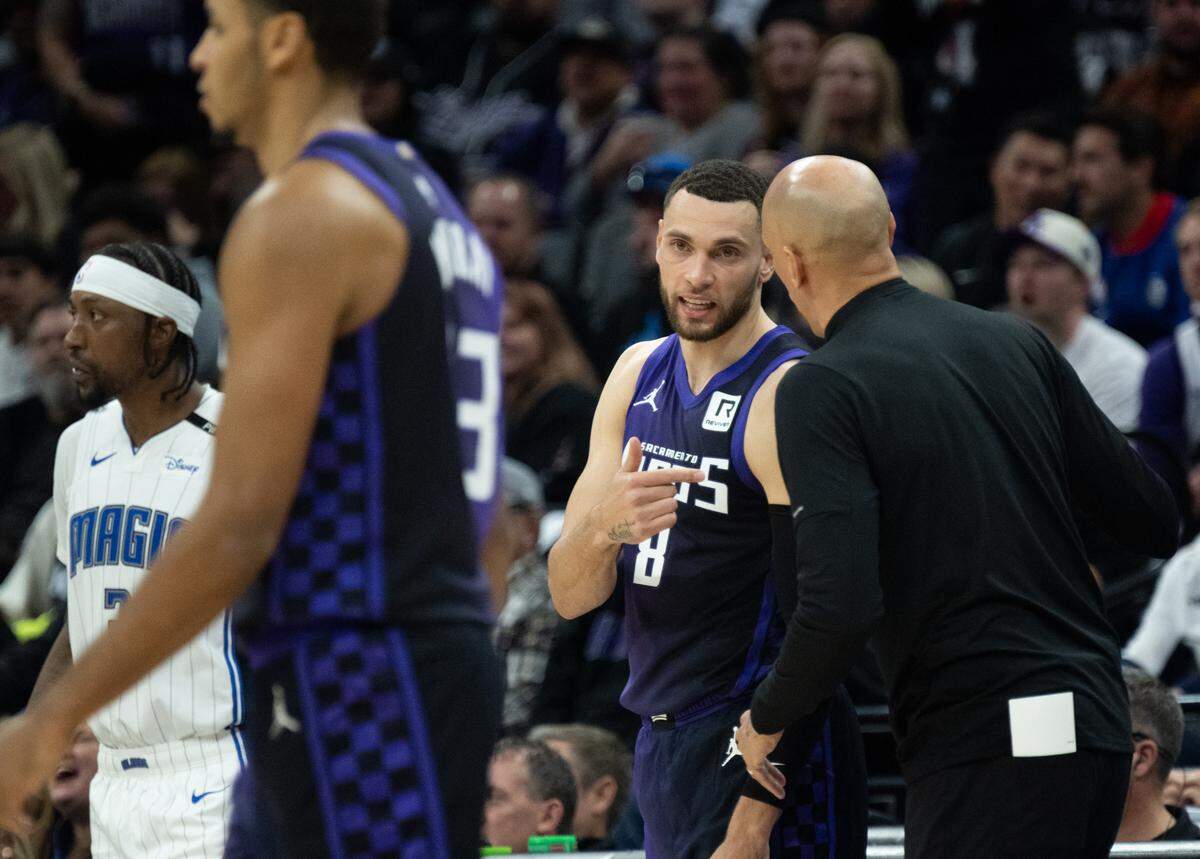 Sacramento Kings guard Zach LaVine (8) speaks with Sacramento Kings coach Doug Christie during an NBA game at Golden 1 Center on Wednesday, Feb. 5, 2025, in Sacramento.