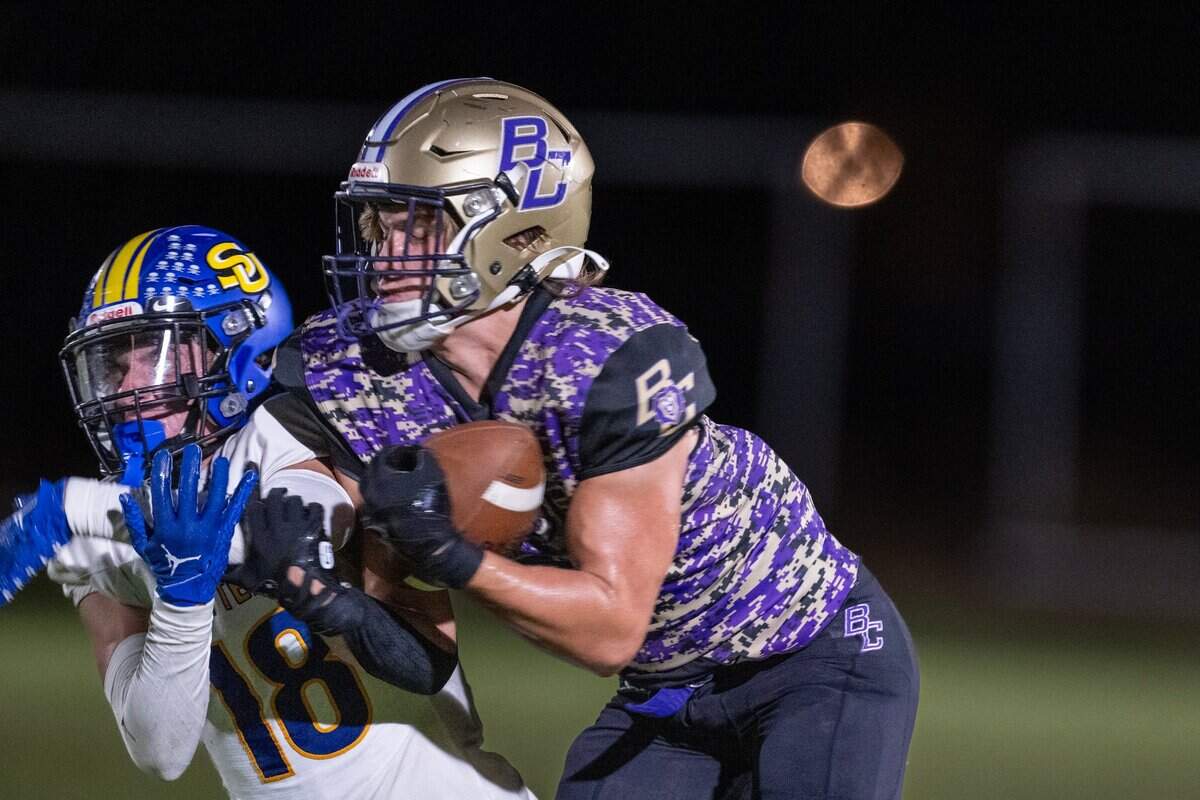 The Bradshaw Christian Pride’s Nathan Zeppieri (1) makes a catch in front of the Sutter Huskies’ Ezra Hilleary (18) in September. The undefeated Pride is are the No. 1 seed in Division VI.
