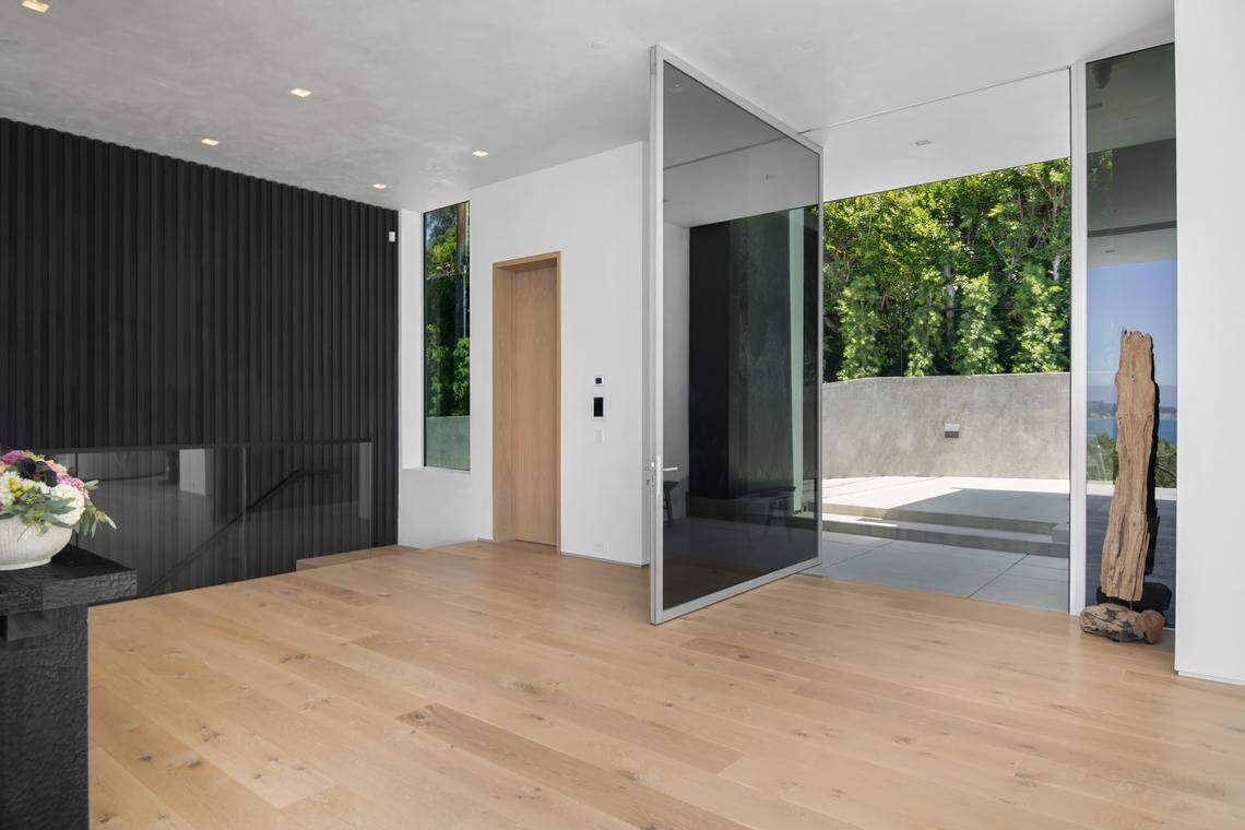 Elegant indoor-outdoor spaces blend seamlessly throughout this architectural retreat.