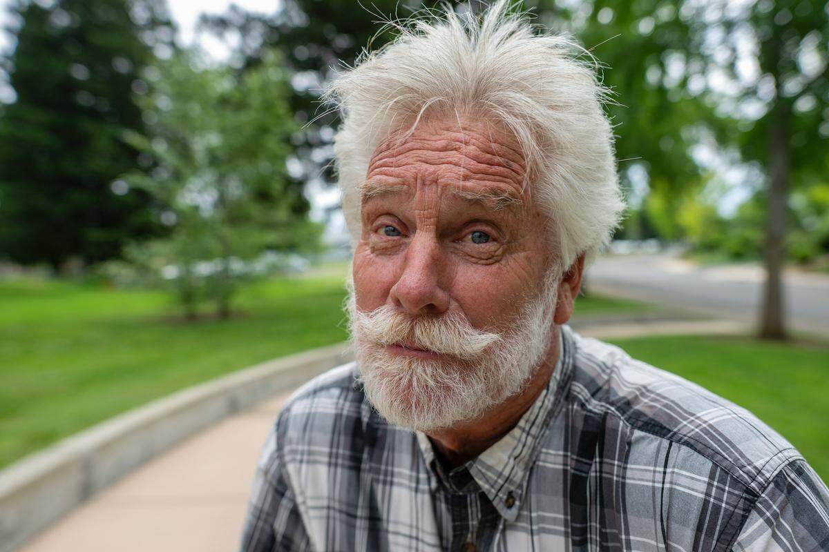 Richard Ethington, a survivor of the 1976 bus crash that killed 28 Yuba City High School choir students and the choir director, sits on a bench by a memorial dedicated to those who were killed and those who survived on Monday in Yuba City. Ethington was sitting behind the driver at the time of the crash and later gave testimony that helped improve transportation safety. 