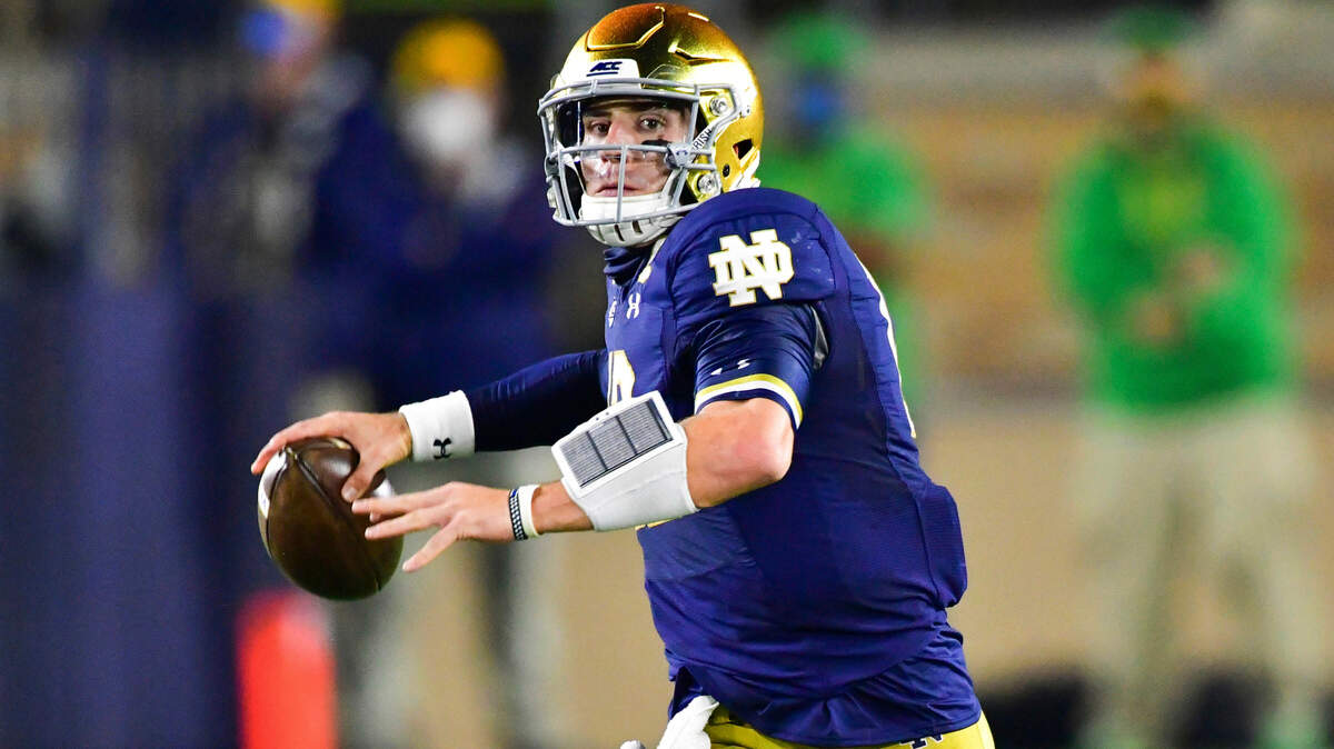 Notre Dame quarterback Ian Book looks for a receiver during the first quarter against Clemson on Saturday.