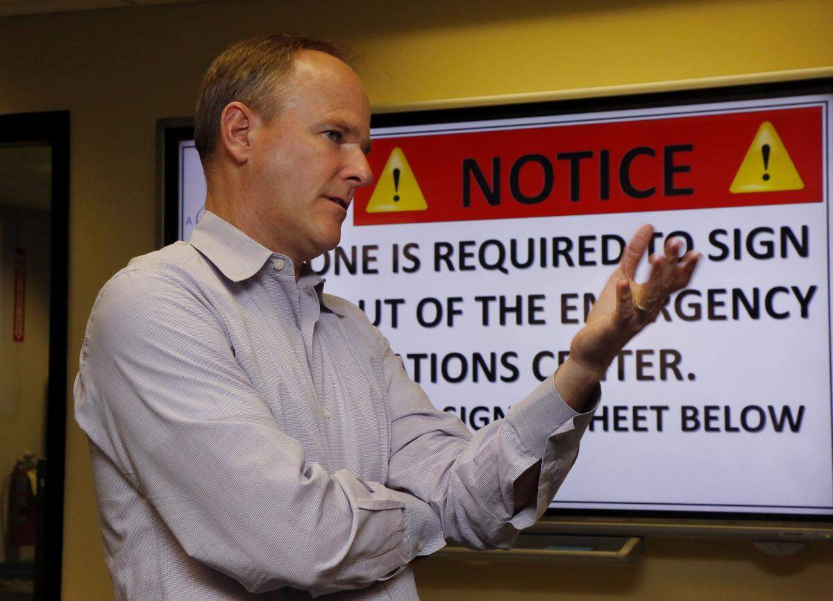 Chris Arends, meteorology program manager at San Diego Gas & Electric, talks about the monitoring systems at the emergency control center at the utility’s headquarters in San Diego on Jan. 14.