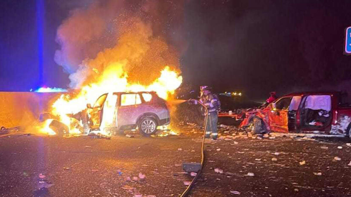 Firefighters work to control a fuel fire following a wrong-way crash on Highway 99 on Friday, July 28, 2023. One motorist was hospitalized in critical condition while another drive was arrested on suspicion of driving under the influence.