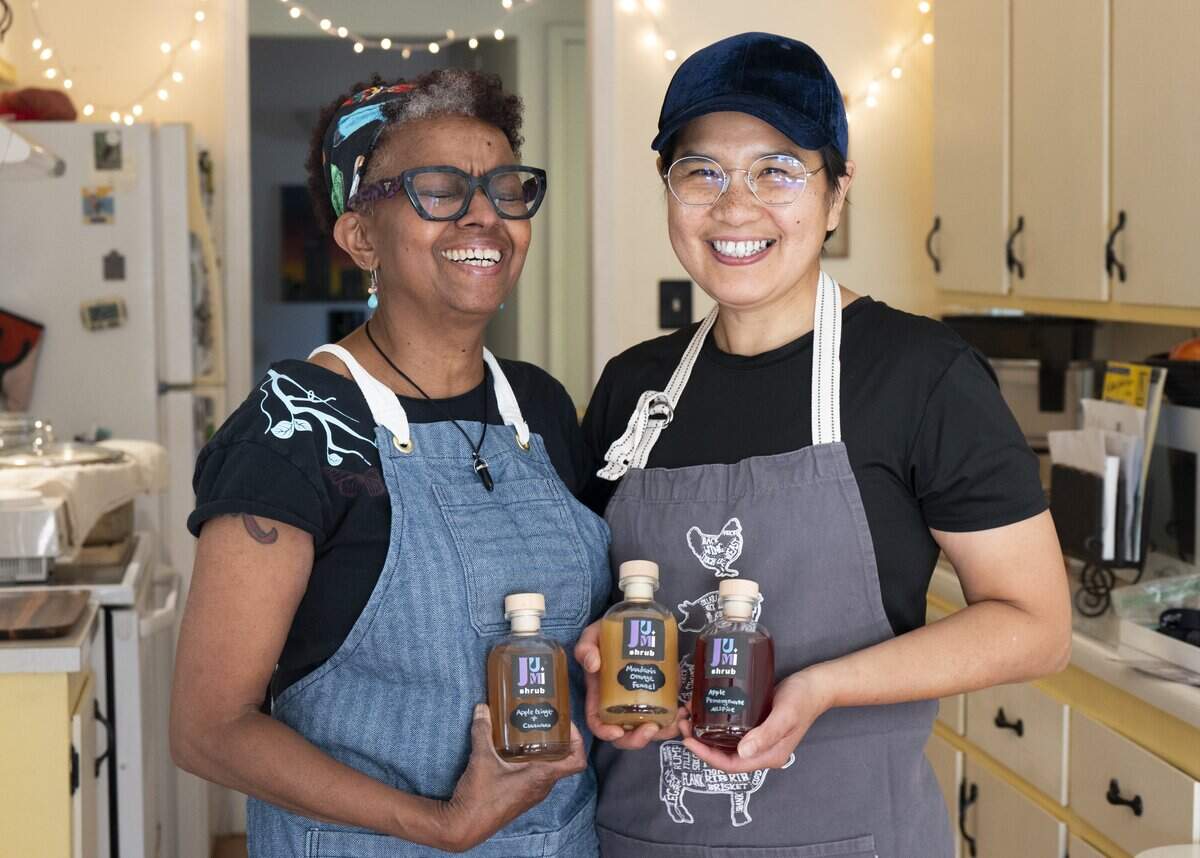 Cindy Lamar and Tina Yang, owners of Jumi Shrub, stand in their kitchen in Davis on June 22.
