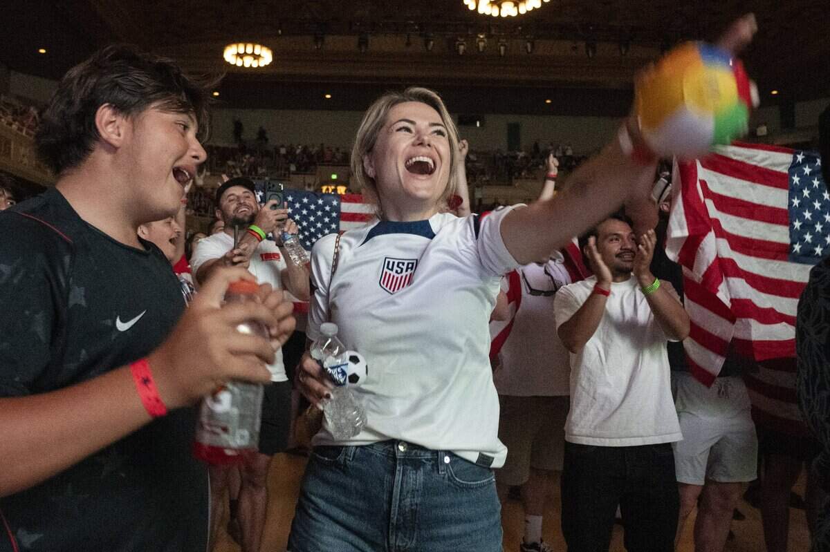 United States fans cheer during a watch party at Memorial Auditorium in Sacramento on Wednesday after the U.S. men's soccer team beat Bosnia and Herzegovina in the World Cup. The game was played in Santa Clara.