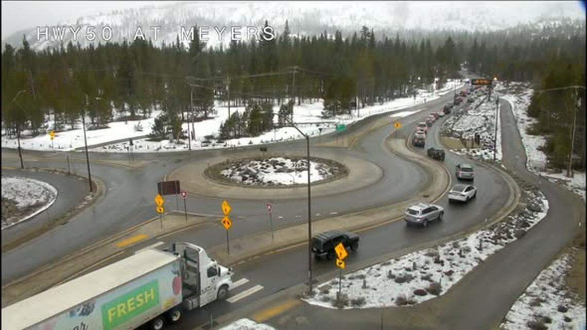 Traffic is stopped as vehicles attempt to merge on to Highway 50 in Meyers on Monday. Caltrans warned travelers should expect heavy delays and be prepared for chain controls.