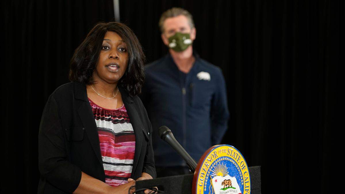 Yolanda Richardson, California’s “vaccine czar,” takes questions from the media about the COVID-19 Johnson and Johnson coronavirus vaccine at the Baldwin Hills Crenshaw Plaza, a shopping mall in a historically Black neighborhood southwest of downtown Los Angeles in April. Richardson announced Wednesday she is leaving the position.