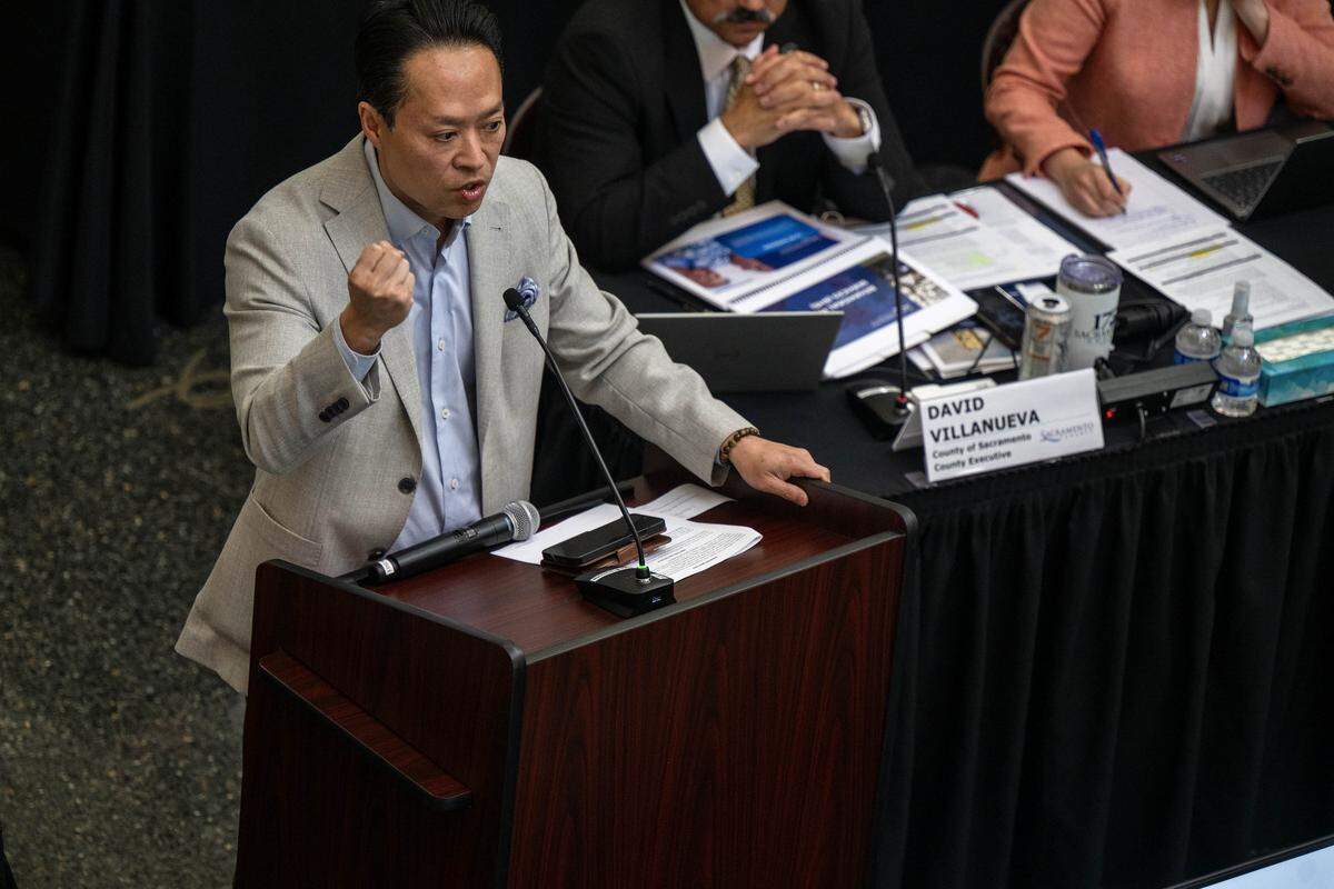 Sacramento County District Attorney Thien Ho gestures while answering questions Tuesday during a county-city meeting on homeless services and behavioral health at the Tsakopoulos Library Galleria in Sacramento.