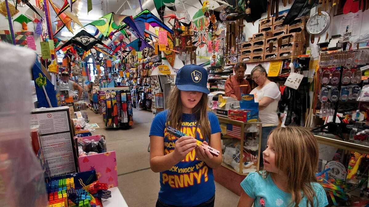 Customers browse through items at the Old City Kites store in Old Sacramento. Sacramento 916 gift cards are back with a bonus ahead of Motherâs Day. Old City Kites is one of the more than 100 stores that accept the gift card.