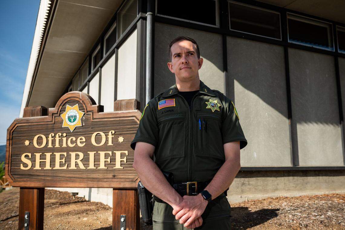 Siskiyou County Sheriff Jeremiah LaRue, appointed to the position last year, stands outside headquarters in Yreka on May 14.