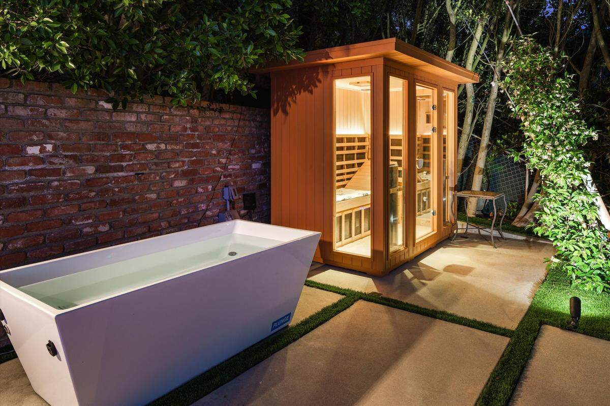 The infrared sauna and cold plunge bath. “The instant you enter the gate, the energy of the mountain to ocean views just sweeps you into a connection with nature,” says the seller Lara Fielding, clinical psychologist and former Victoria’s Secret model.