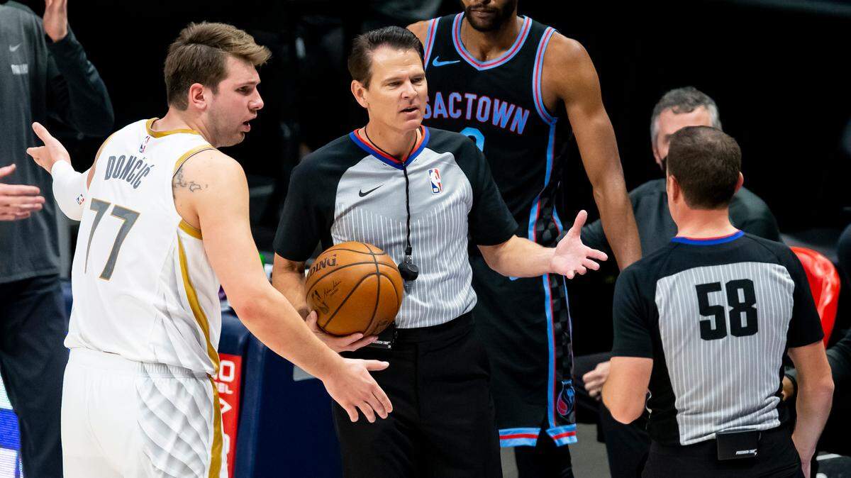 Dallas Mavericks guard Luka Doncic (77) argues a call during the second half of a NBA basketball game against the Sacramento Kings, Sunday, April 18, 2021, in Dallas. (AP Photo/Brandon Wade)