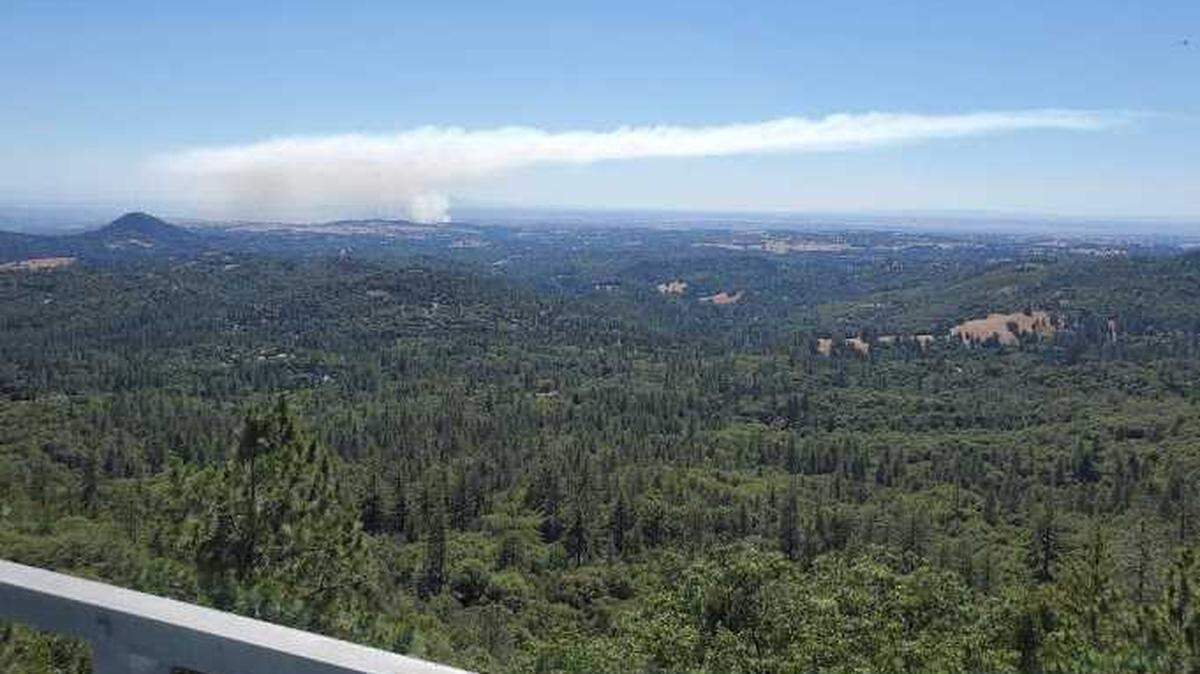 Smoke from the Goose Fire in Amador County is seen on Sunday, June 12, 2021. The wildfire was burning at a moderate rate of spread and briefly prompted evacuations along Goose Hill Ranch Road, as well as the Lake Amador campgrounds. An hour later, firefighters rescinded evacuations and road closures.