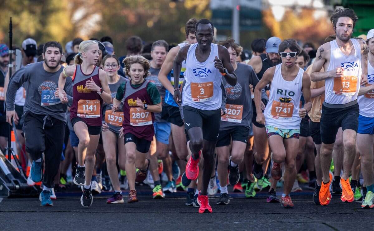 Participants of the 30th annual Run to Feed the Hungry on start the 5K race in East Sacramentok on Thursday.