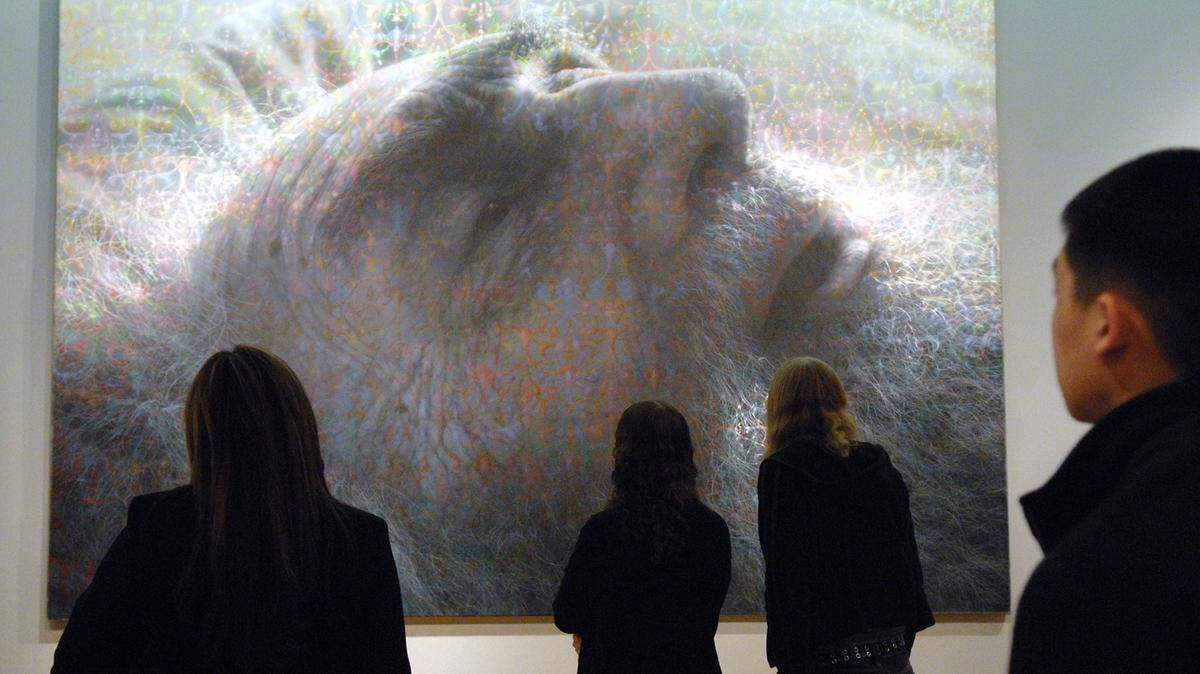 Cosumnes River College art history students study the painting “Portrait of My Father” by Stephen Kaltenbach during a tour at the Crocker Art Museum in Jan. 28, 2007.