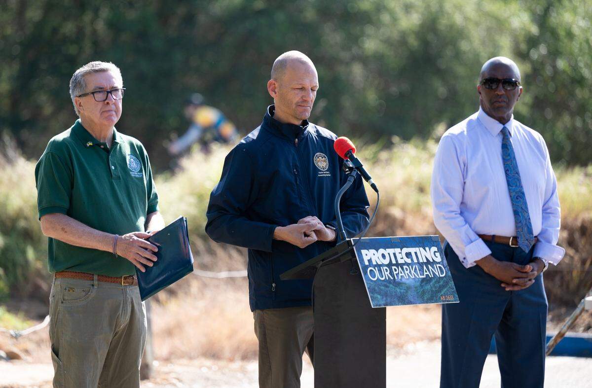 Assembly members Ken Cooley, Kevin McCarty and Jim Cooper launch a plan Friday in Rancho Cordova to address public safety and enviromental destruction on the American River Parkway. They have introduced AB 2633 that authorized removal of illegal campsites from parklands.