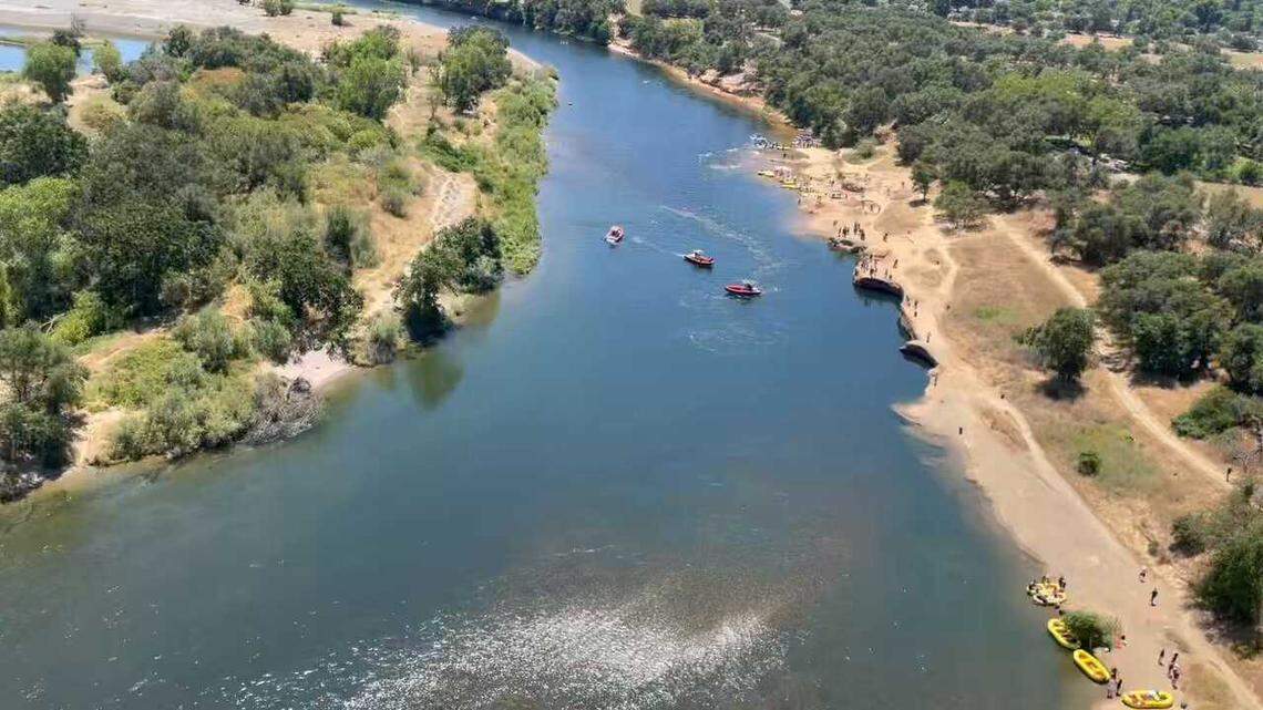 Boats search the American River after a man rafting with a large group went underwater near Clay Banks in Rancho Cordova on Saturday, June 15, 2024. Dive teams have been deployed after rescuers were unable to find the man.